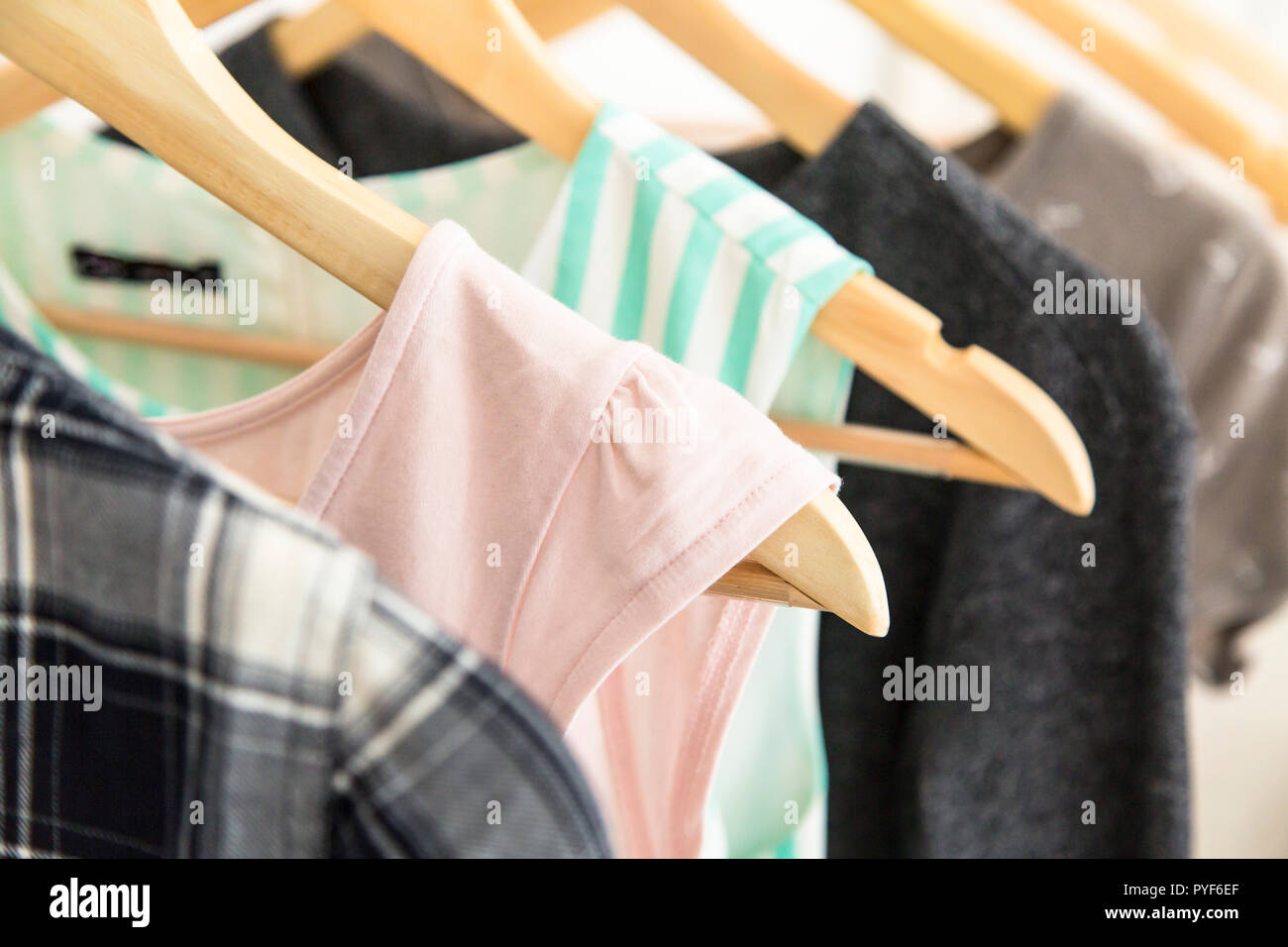 Hangers with woman clothes wardrobe Stock Photo Alamy
