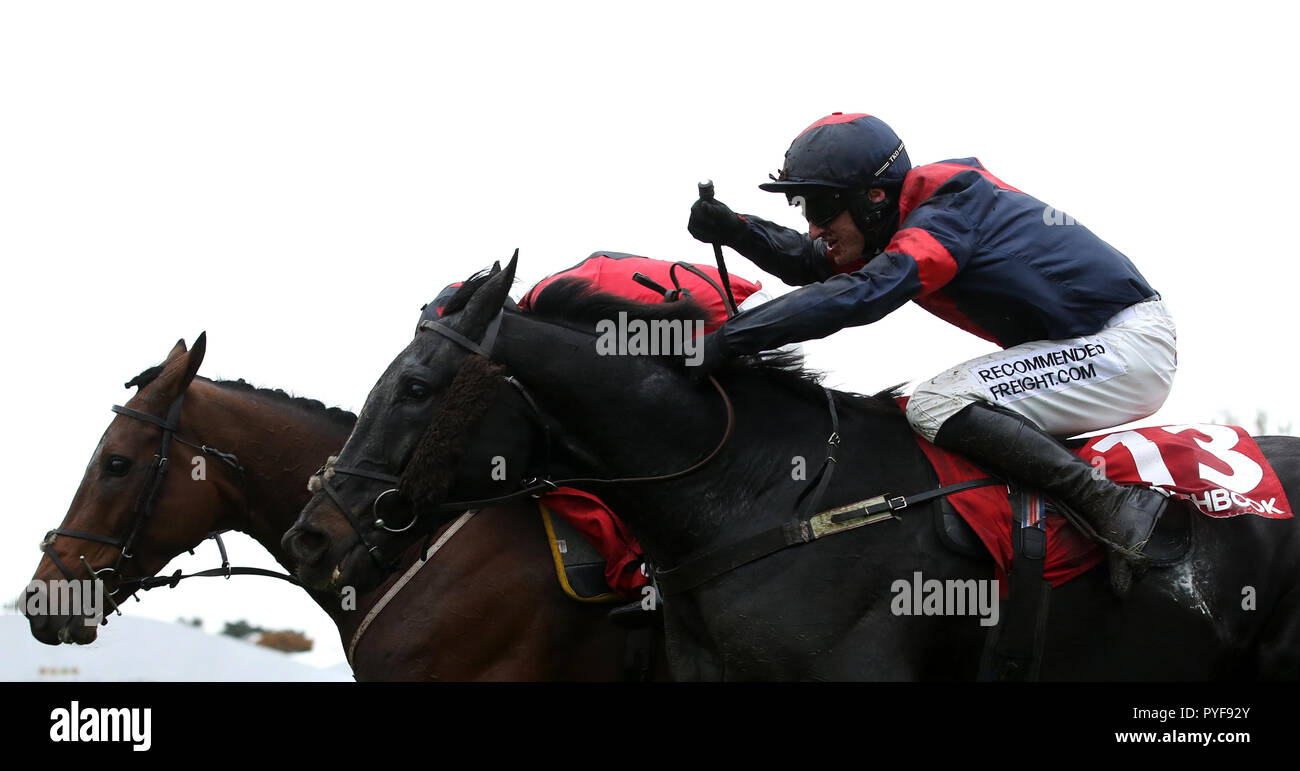 Relentless Dreamer ridden by Adam Wedge (right) wins the 'Matchbook Betting Exchange' Handicap Chase ahead of Cogry ridden by Sam Twiston-Davies during day two of The Showcase at Cheltenham Racecourse. Stock Photo