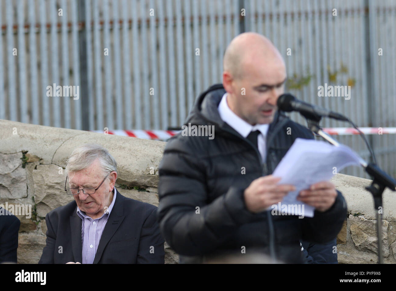 Billy Begley the father of Shankill bomber Thomas Begley listens to former PIRA member Sean Kelly speak at Milltown Cemetery in West Belfast, as Hundreds of people from across the communities of Northern Ireland have come together for a church service to mark the 25th anniversary of the Shankill bomb. Stock Photo