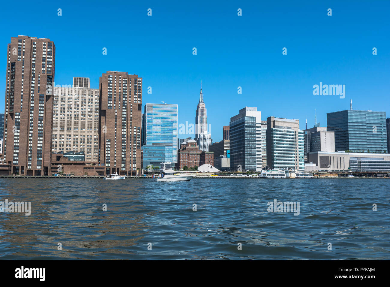 Skyscrapers Of Manhattan View From The East River New York City Stock Photo Alamy