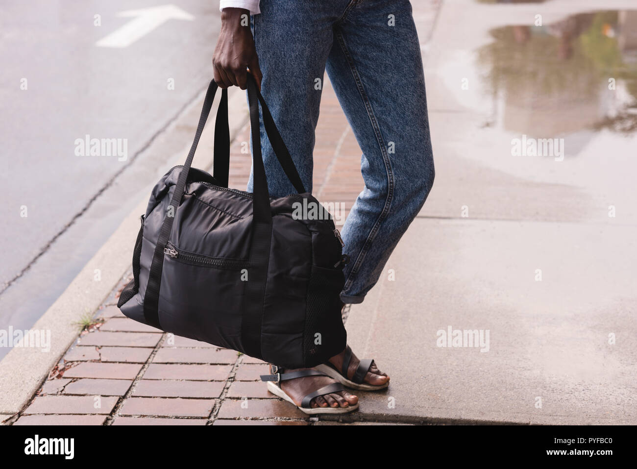Woman walking sidewalk hi-res stock photography and images - Alamy
