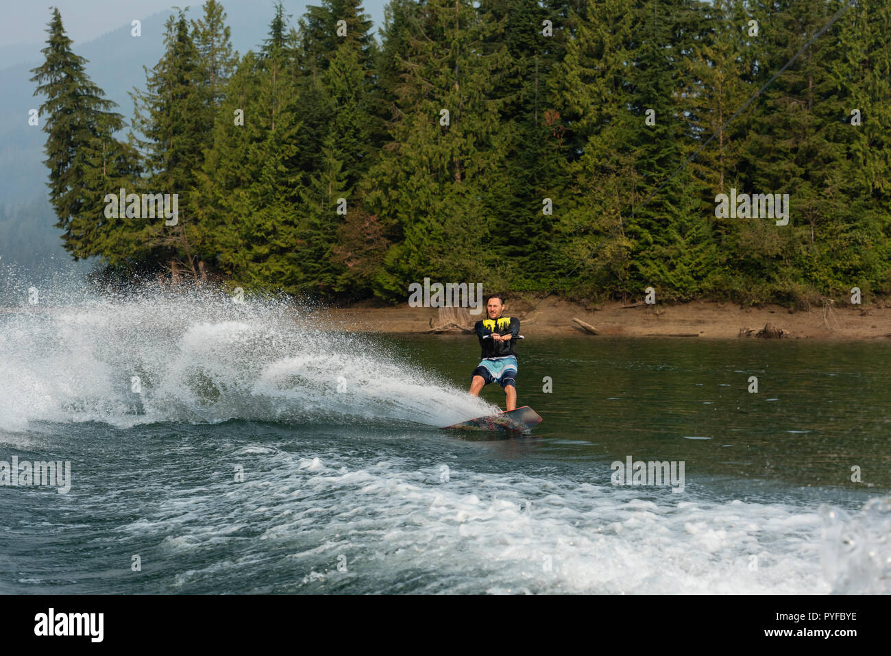 Man wakeboarding in the river Stock Photo
