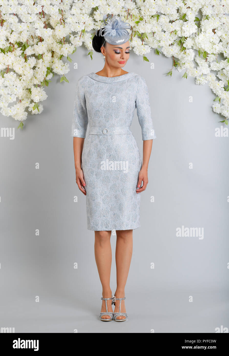 LUIS CIVIT Spanish designer collection from Barcelona covering all aspects  of special occasion wear, mother of the bride outfits with hats to match  Stock Photo - Alamy