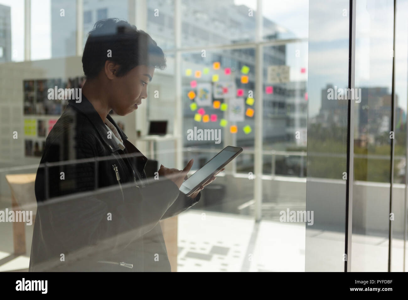 Business executive using digital tablet in office Stock Photo