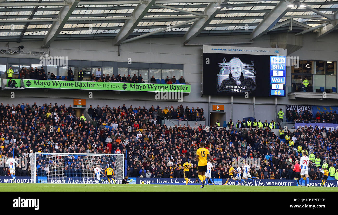 The electronic screen displays a tribute to sports commentator and Brighton and Hove Albion fan Peter Brackley, who passed away last week, during the Premier League match at The AMEX Stadium, Brighton. Stock Photo