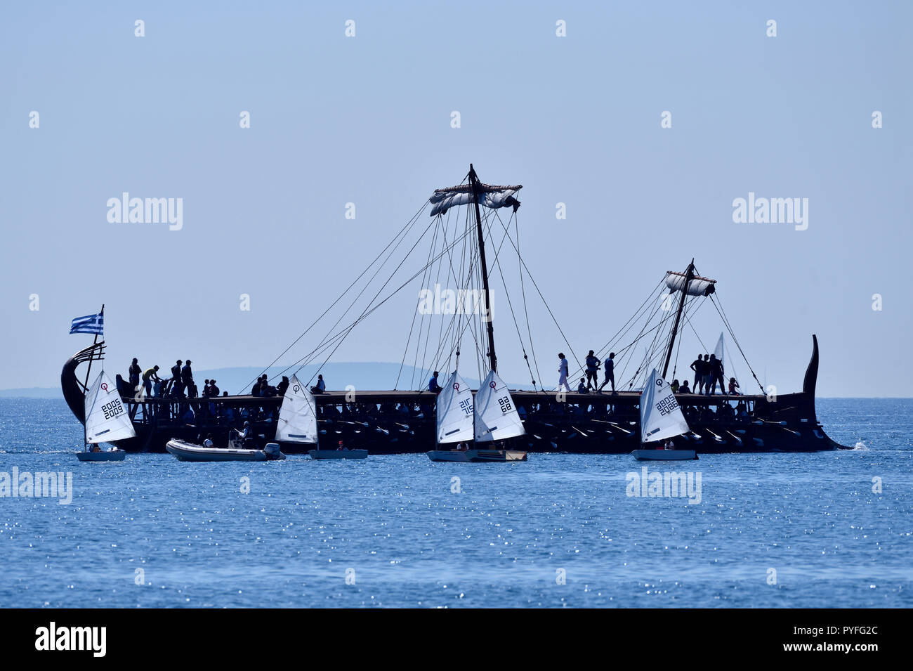 Trireme Olympias and Optimist sailing boats in Faliro, Athens, Greece Stock Photo