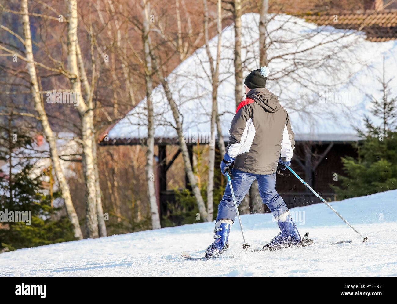 GERARDMER, FRANCE - FEB 16- Closeup on beginner skier during the annual winter school holiday on Feb 16, 2015 in Gerardmer, France Stock Photo