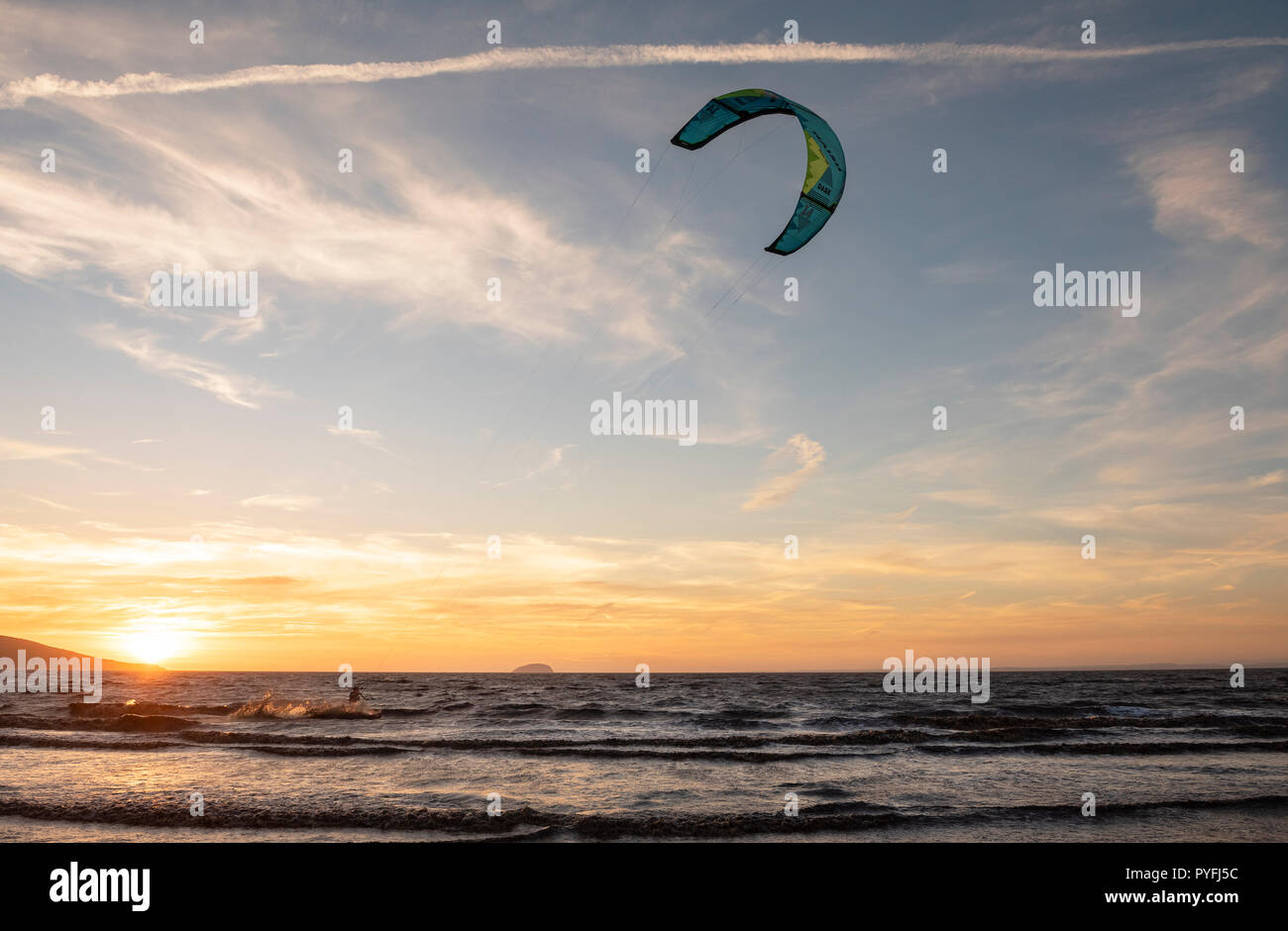 Kite Surfing with a beautiful sunset at Weston super Mare. Stock Photo