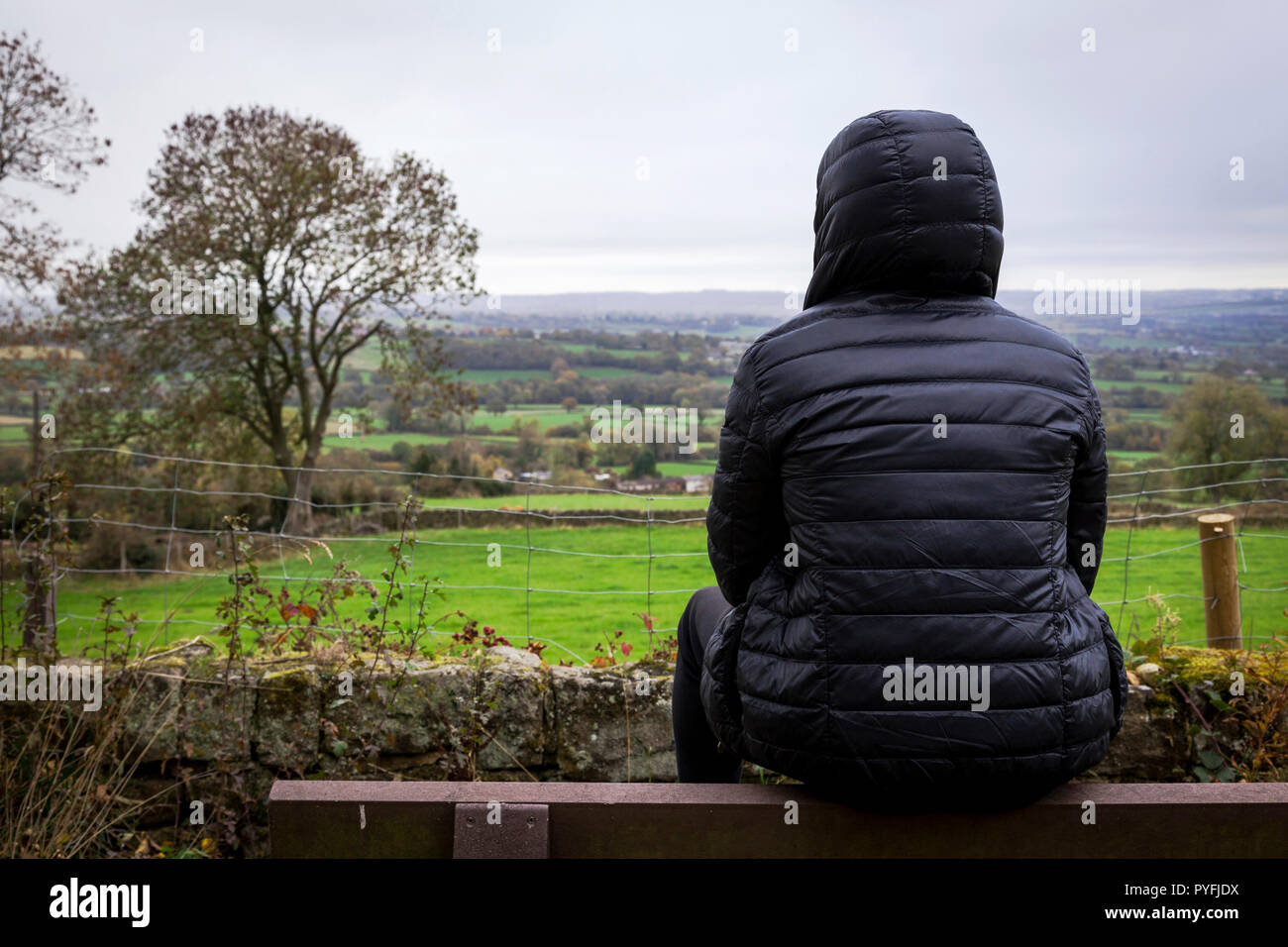 A lone male in a rural location in England, U.K. Stock Photo