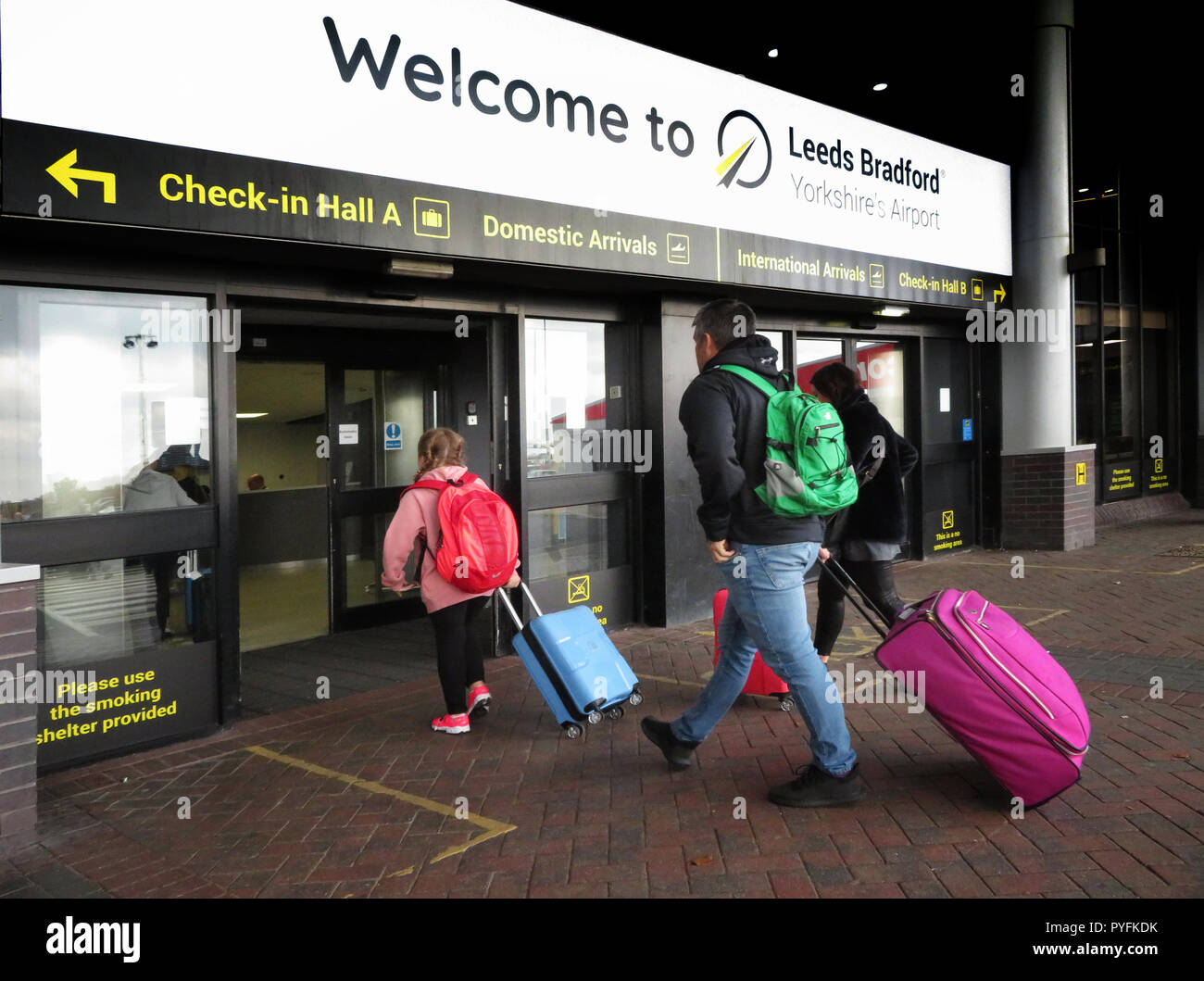 Passengers arrive at Leeds Bradford Airport Yeadon West Yorkshire England Stock Photo