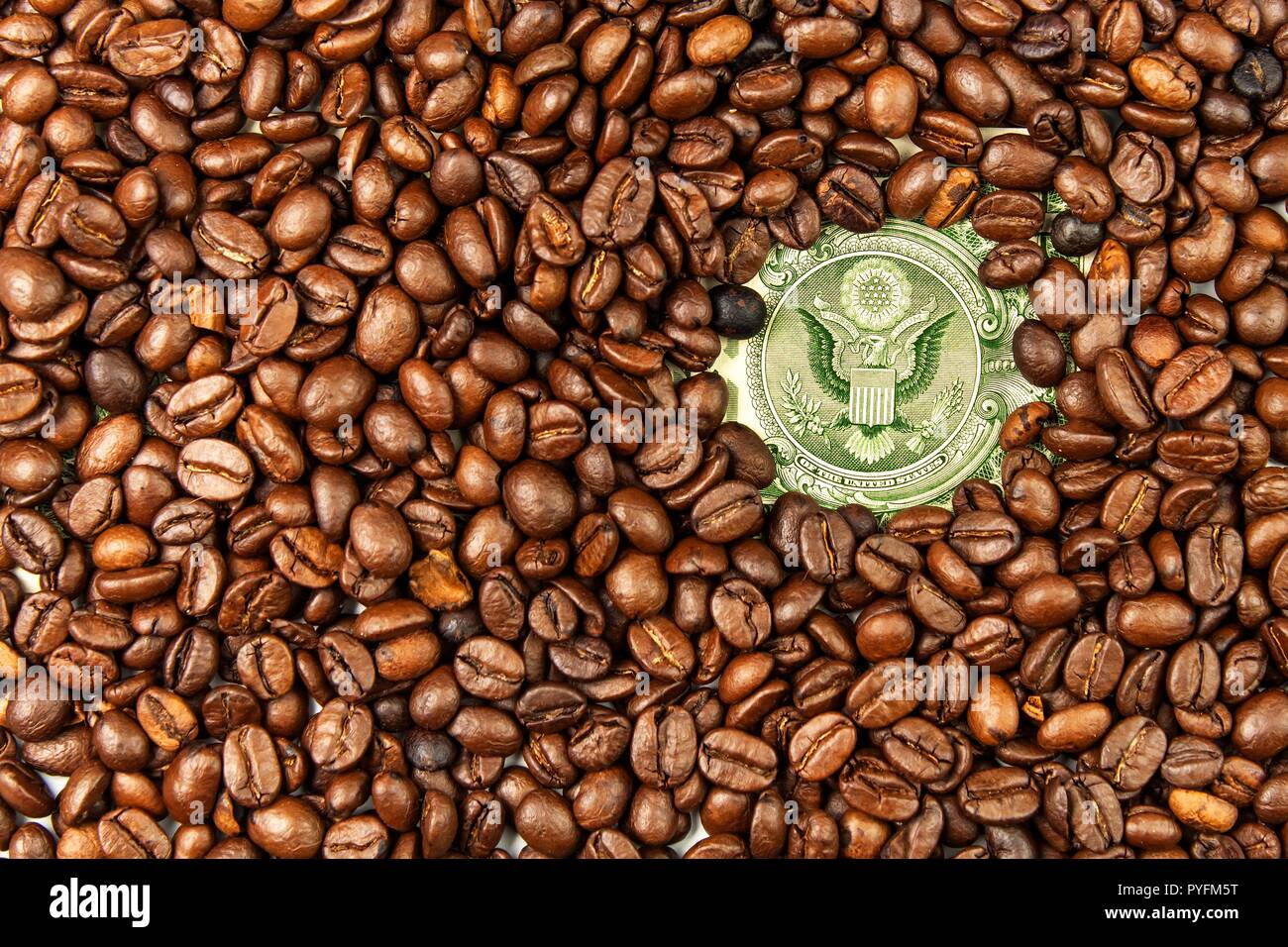 Coffee beans and money. Fair Trade. Sale of coffee. Commodity trade