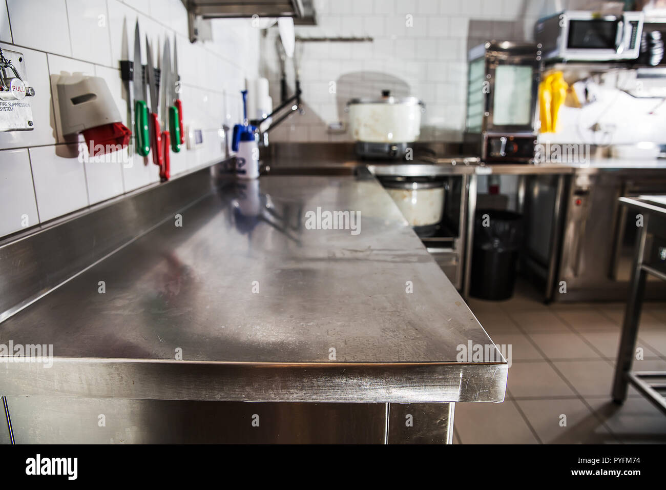 Professional kitchen, view counter in stainless steel . Stock Photo