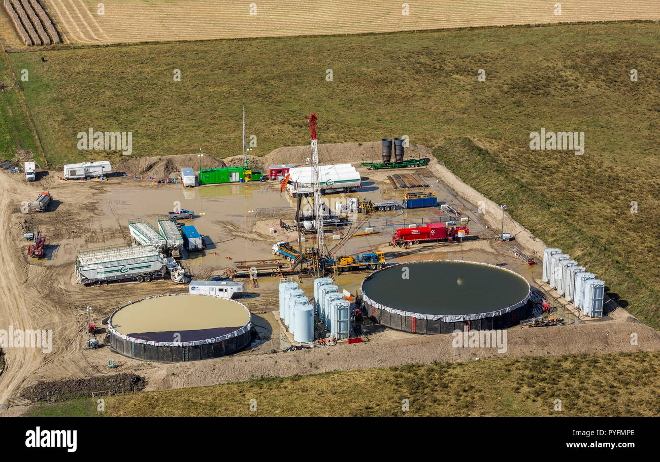 Service rig and operations at lease near Cochrane, Alberta Canada Stock Photo