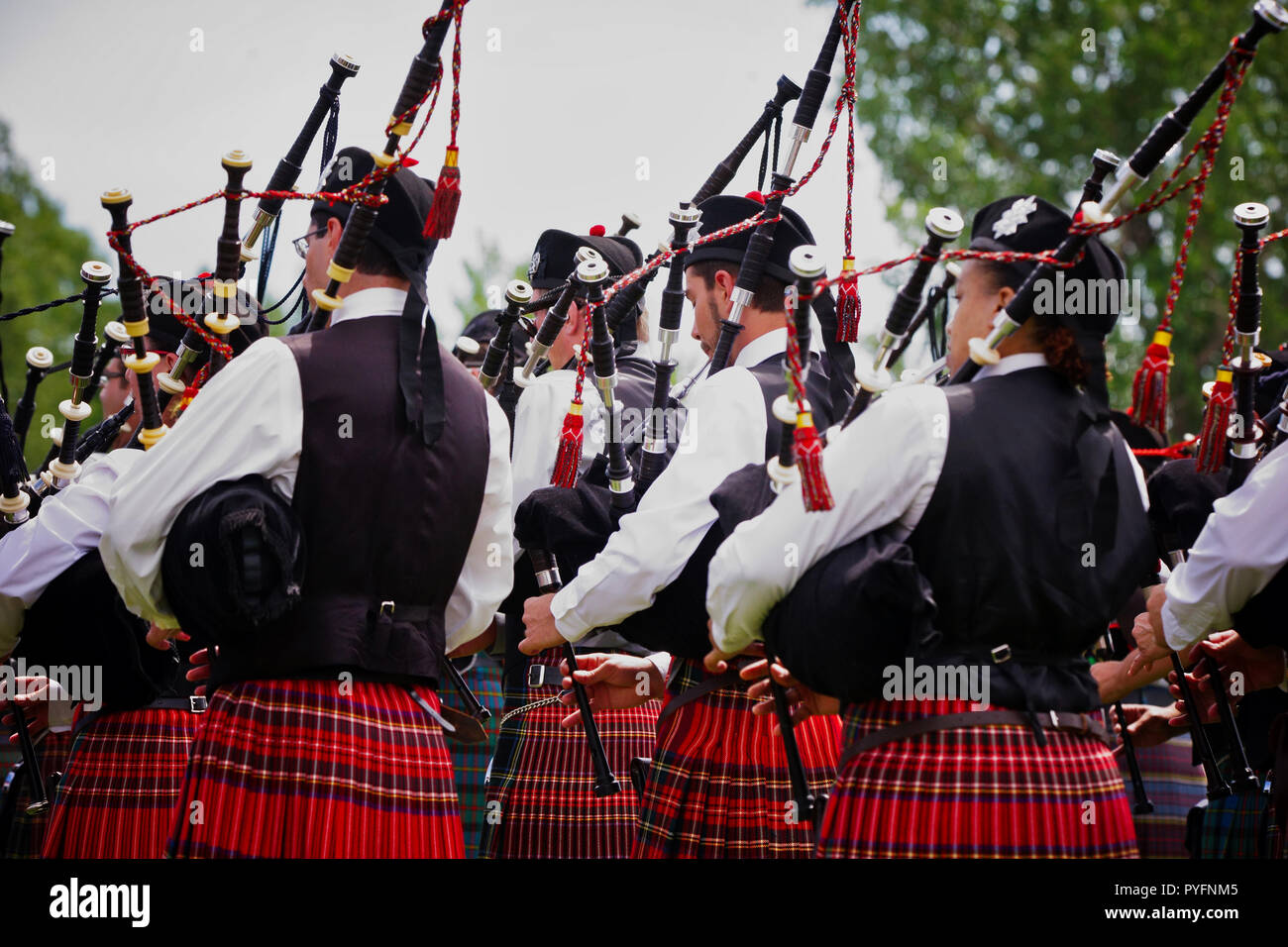 Scottish bagpipers seen from behind..Credit:Mario Beauregard/Alamy Live News Stock Photo