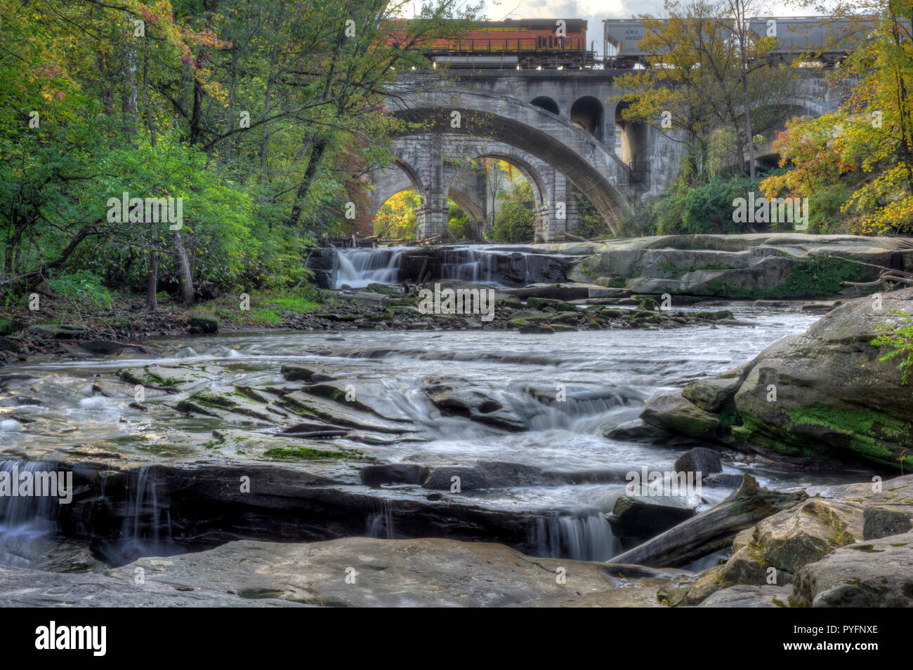 Berea Falls Ohio during fall colors. The stone arch train bridges make