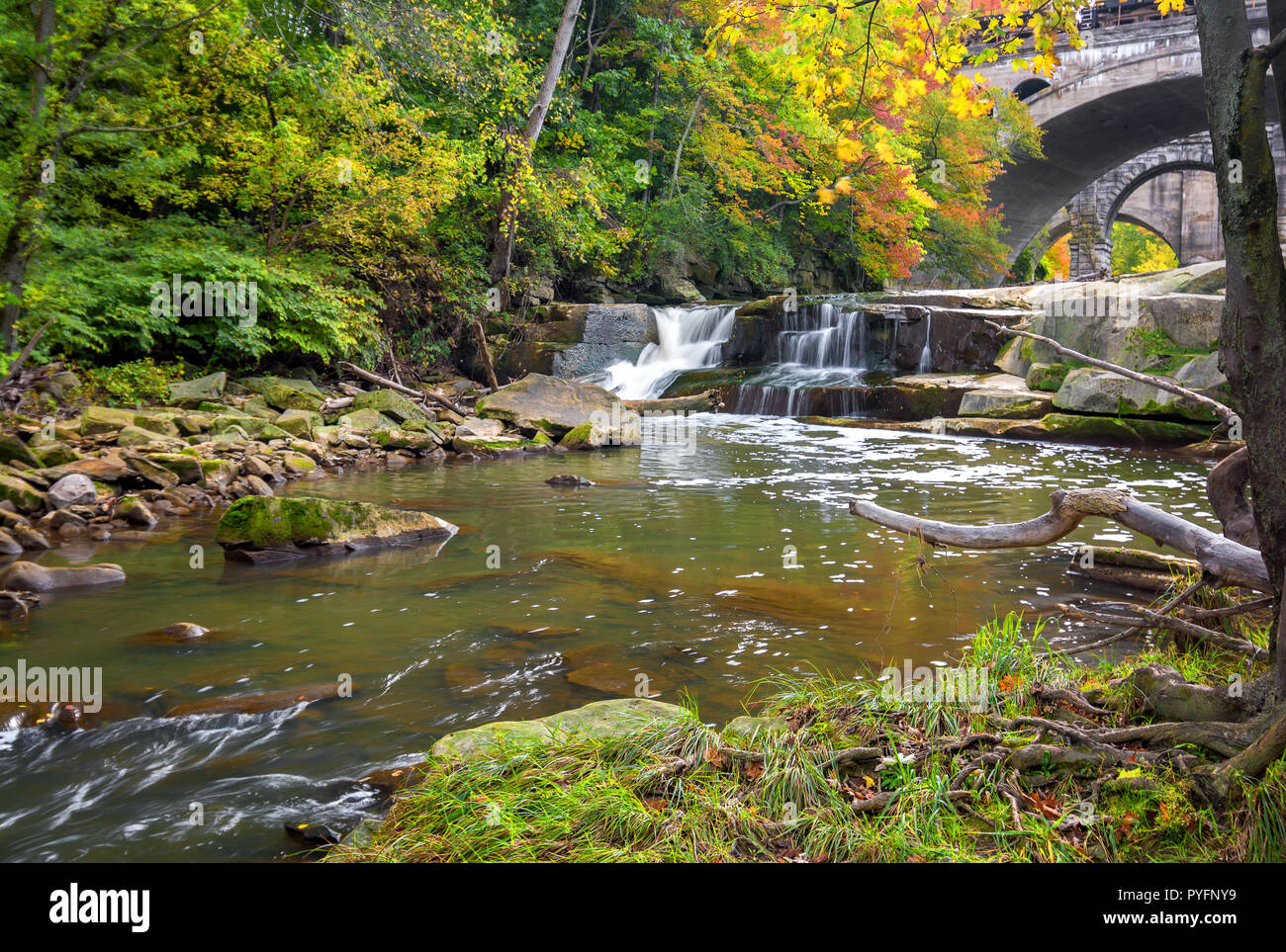 Berea Falls Ohio with fall colors. This cascading waterfall looks it's