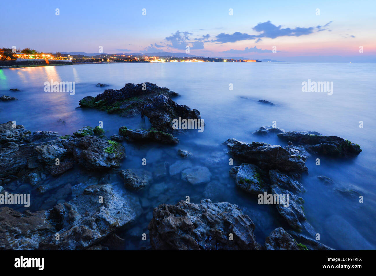 Blue water and rocks - Greece islands coastline Stock Photo - Alamy