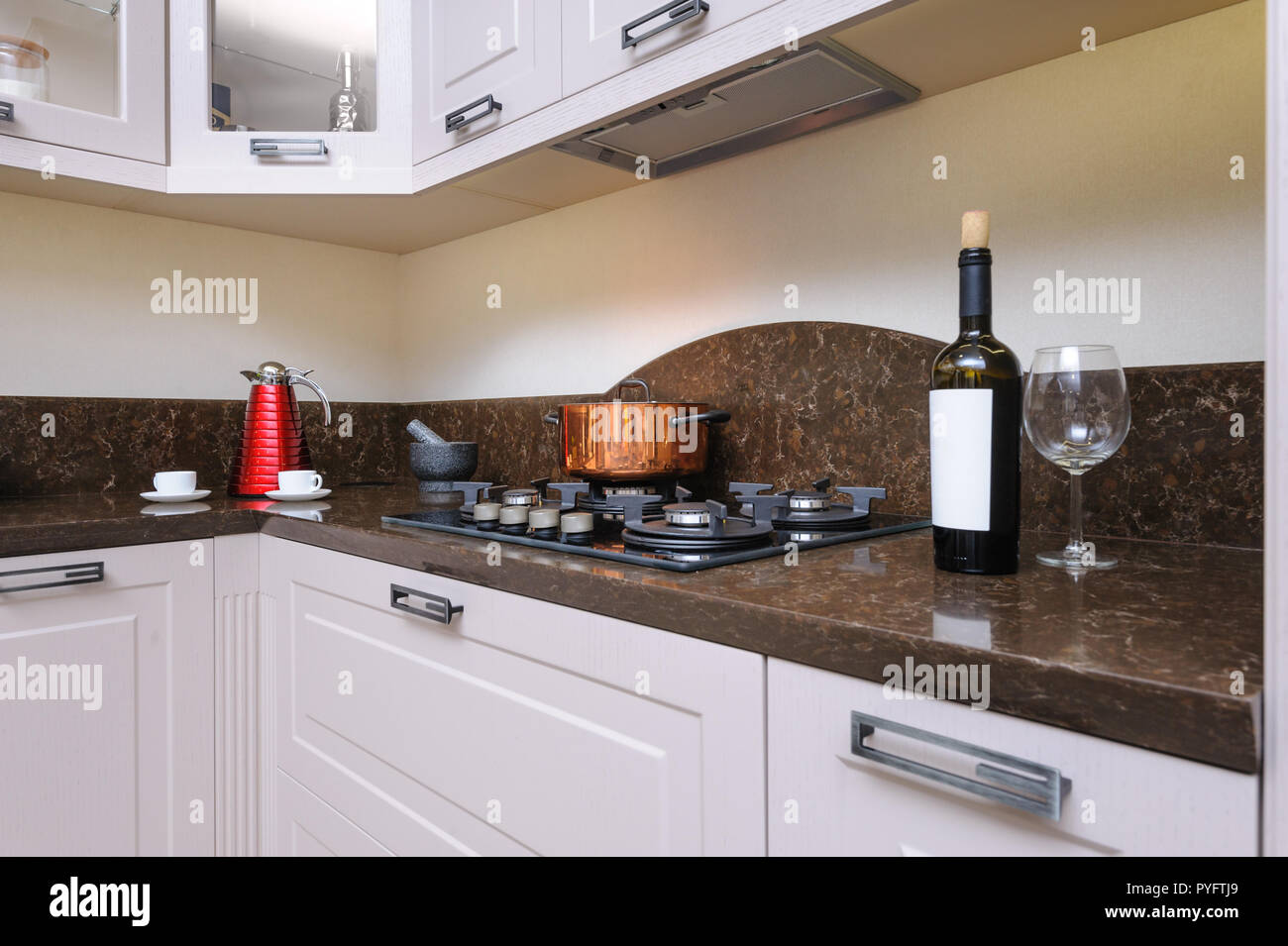 https://c8.alamy.com/comp/PYFTJ9/luxury-modern-beige-kitchen-PYFTJ9.jpg