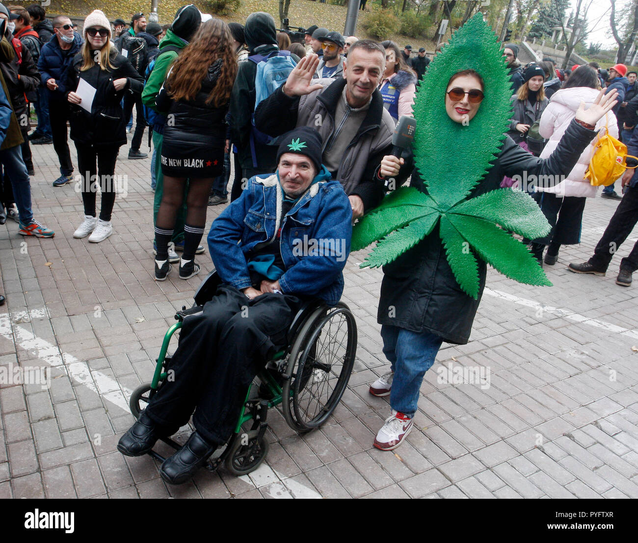 A disabled man is seen on his wheelchair during the protest. March of Liberty 2018 rally for cannabis that took place in front of the Cabinet of Ministers in downtown where a group of protesters have gathered for decriminalization of marijuana smokers and for allowing the use of marijuana by medical, they also demand that marijuana should be singled out from the hard drugs. Stock Photo