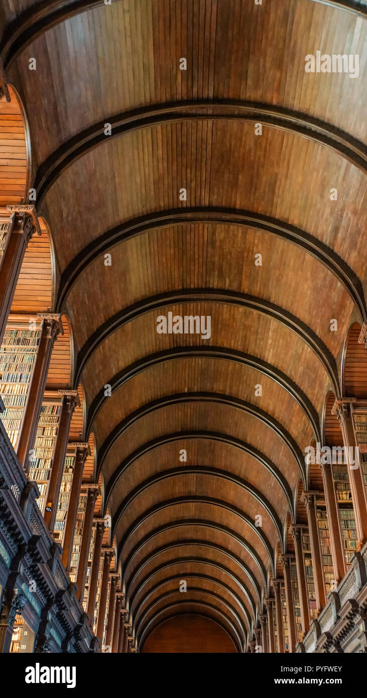 The historic Long Room  of the Old Library  at Trinity College housing a valuable archive of ancient and historic books  in Dublin,  Ireland Stock Photo