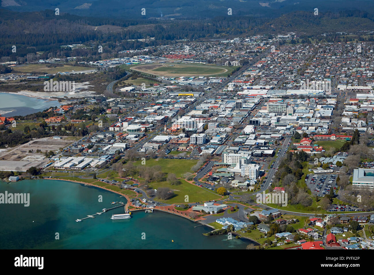 Lake Rotorua, waterfront, and city centre, Rotorua, North Island, New Zealand - aerial Stock Photo
