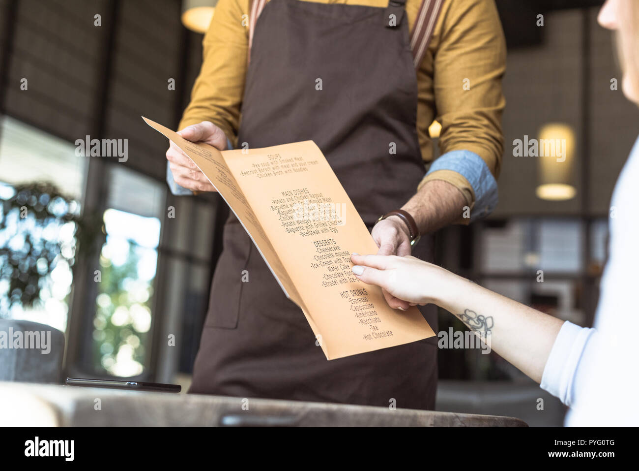 Waiter And Gesture High Resolution Stock Photography and Images Alamy