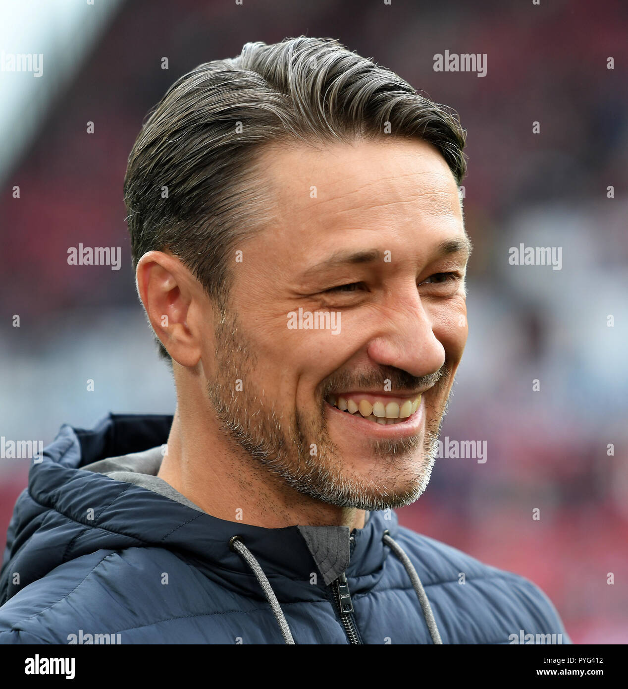 Mainz, Germany. 27th Oct, 2018. 27 October 2018, Germany, Mainz: Soccer: Bundesliga, FSV Mainz 05 - Bayern Munich, 10th matchday in the Opel Arena. Munich's coach Niko Kovac smiles before the game. Credit: Torsten Silz/dpa - IMPORTANT NOTICE: DFL an d DFB regulations prohibit any use of photographs as image sequences and/or quasi-video./dpa/Alamy Live News Stock Photo