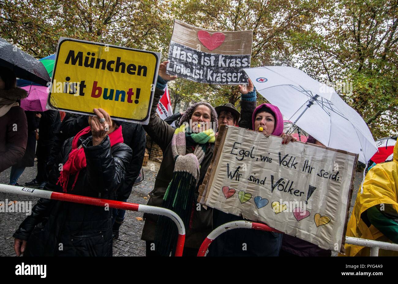 Munich, Bavaria, Germany. 27th Oct, 2018. Counter-demonstrators against Pegida. Attempting to draw more followers and expand PEGIDA into Bavaria, "Pegida Dresden"" announced an appearance by founders LUTZ BACHMANN and SIEGFRIED DAEBRITZ in Munich's Neuhausen district. Ultimately, the two did not arrive, leaving approximately 40 Pegida followers to march against over 450 counter-demonstrators. Pegida Dresden in Munich is actually Pegida Nuremburg who is attempting to expand south to Munich where the rival Pegida Muenchen is already active. The latter group is more closely associated Stock Photo