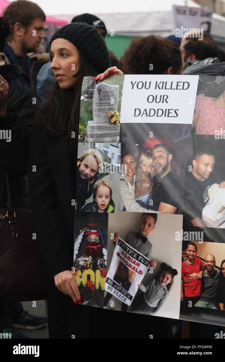 London, UK, 27th October, 2018. Friends, family and supporters campaigning for justice for people who died in custody, or while being arrested  take part In the 20th annual march organised by the United Families and Friends Campaign. The march  goes from Trafalger Square to Downing Street, where a petition is handed in. Roland Ravenhill/Alamy Live News. Stock Photo