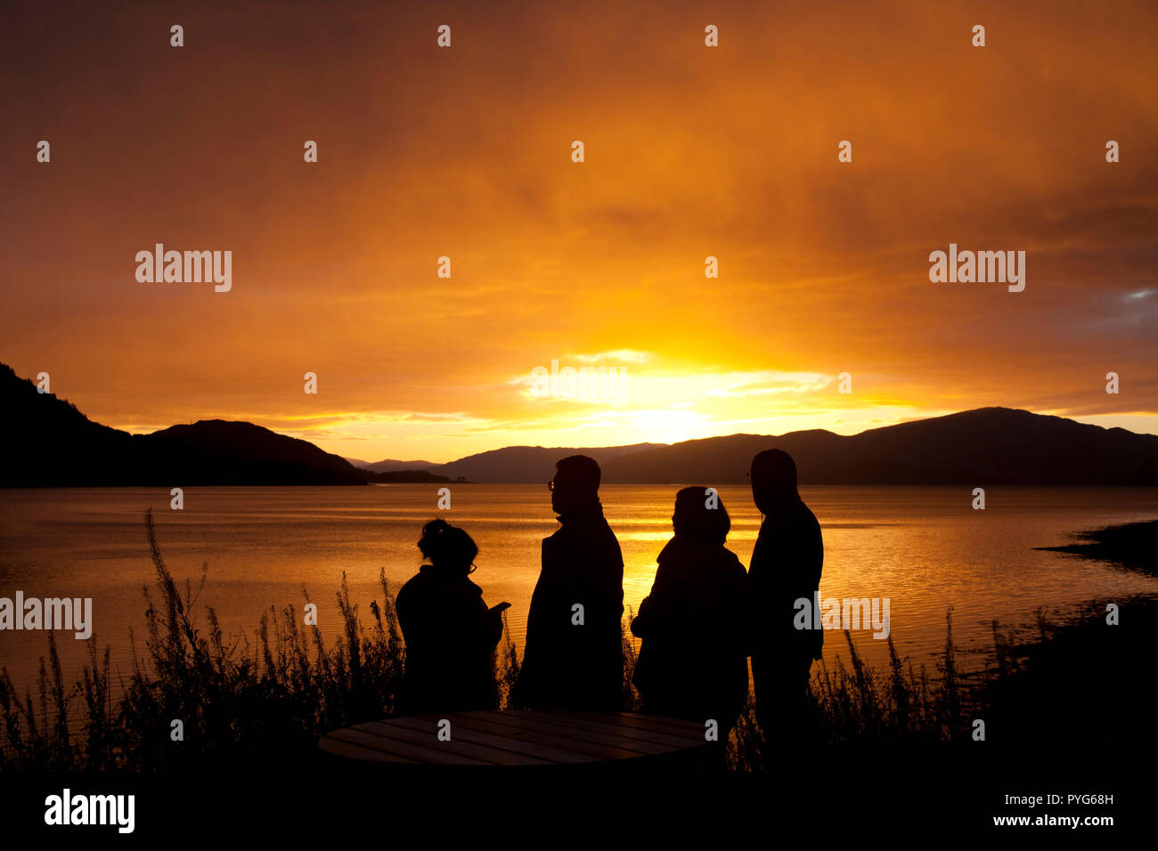 Loch Linnhe, Lochaber, Scotland, UK. 27 Oct. 2018, UK weather, tourist watch and photograph stunning sunset over Loch Linnhe looking towards Ardnamurchan, north west Scotland. Stock Photo