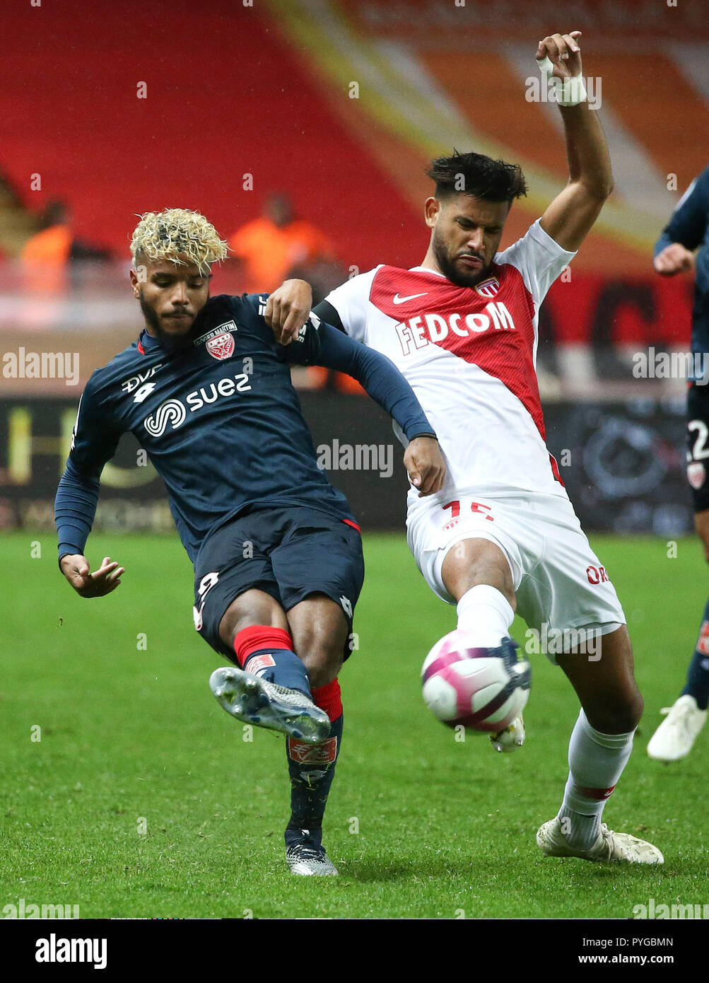Fontvieille, Monaco. 27th Oct, 2018. Youssef Ait Bennasser (R) of Monaco  vies with Valentin Rosier of Dijon during the 2018-2019 French Ligue 1  match between Monaco and Dijon in Fontvieille, Monaco, Oct.