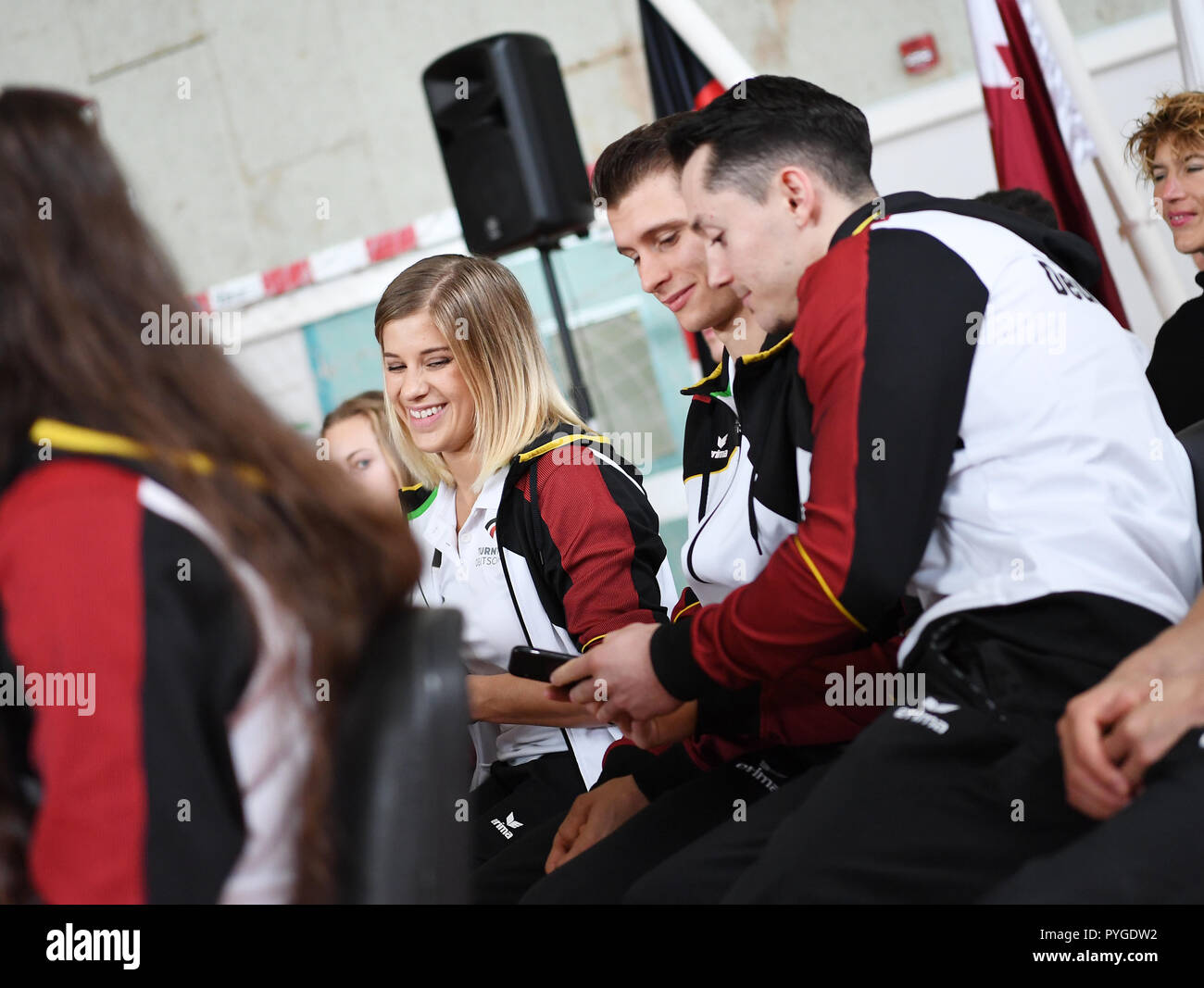 Doha, Katar. 28th Oct, 2018. Elisabeth Seitz (Germany/Stuttgart), Lukas Dauser (Germany/Unterhaching), Andreas Toba (Germany/Hannover) (from left). GES/Gymnastics/Gymnastics World Championships in Doha, Visit Turnteam Germany in the German School Doha, 28.10.2018 - GES/Artistic Gymnastics/Gymnastics World Championships: 28.10.2018 - | usage worldwide Credit: dpa/Alamy Live News Stock Photo