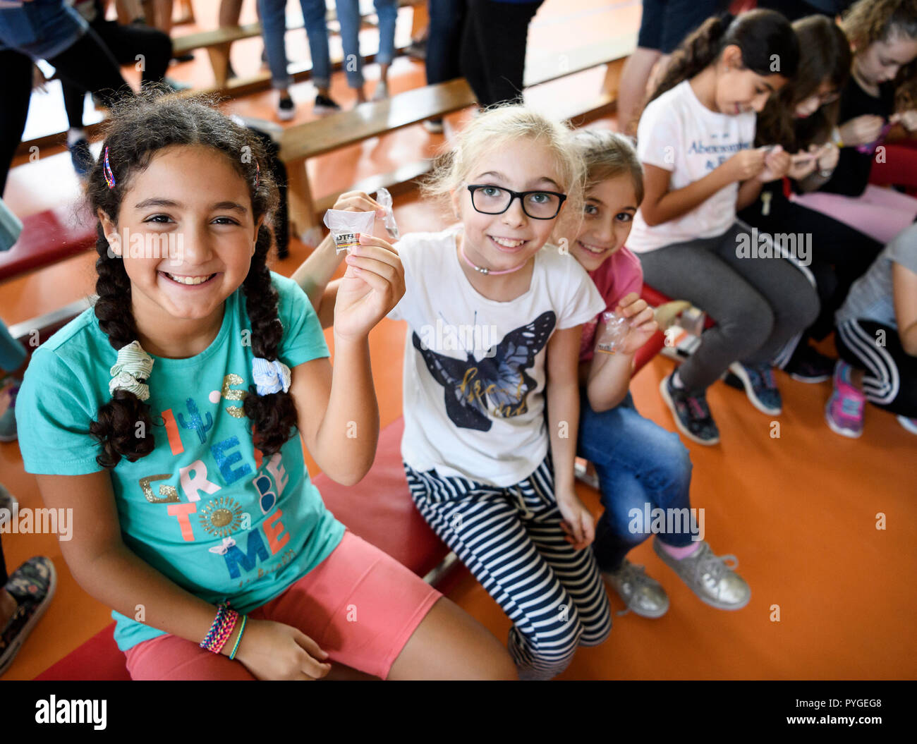 Students get DTB pins. GES / Gymnastics / Gymnastics World