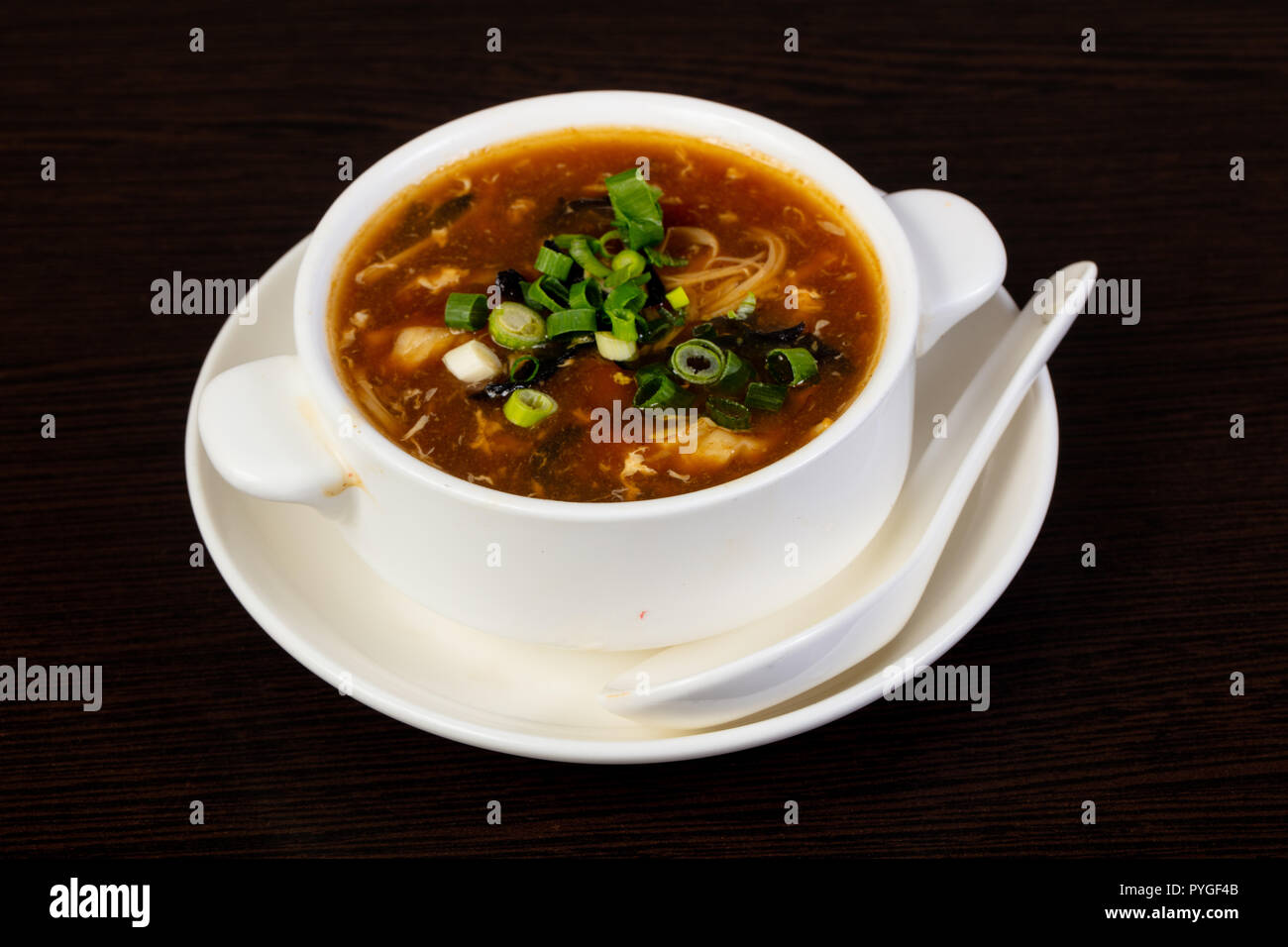 Chinese cuisine - soup with seafood Stock Photo - Alamy