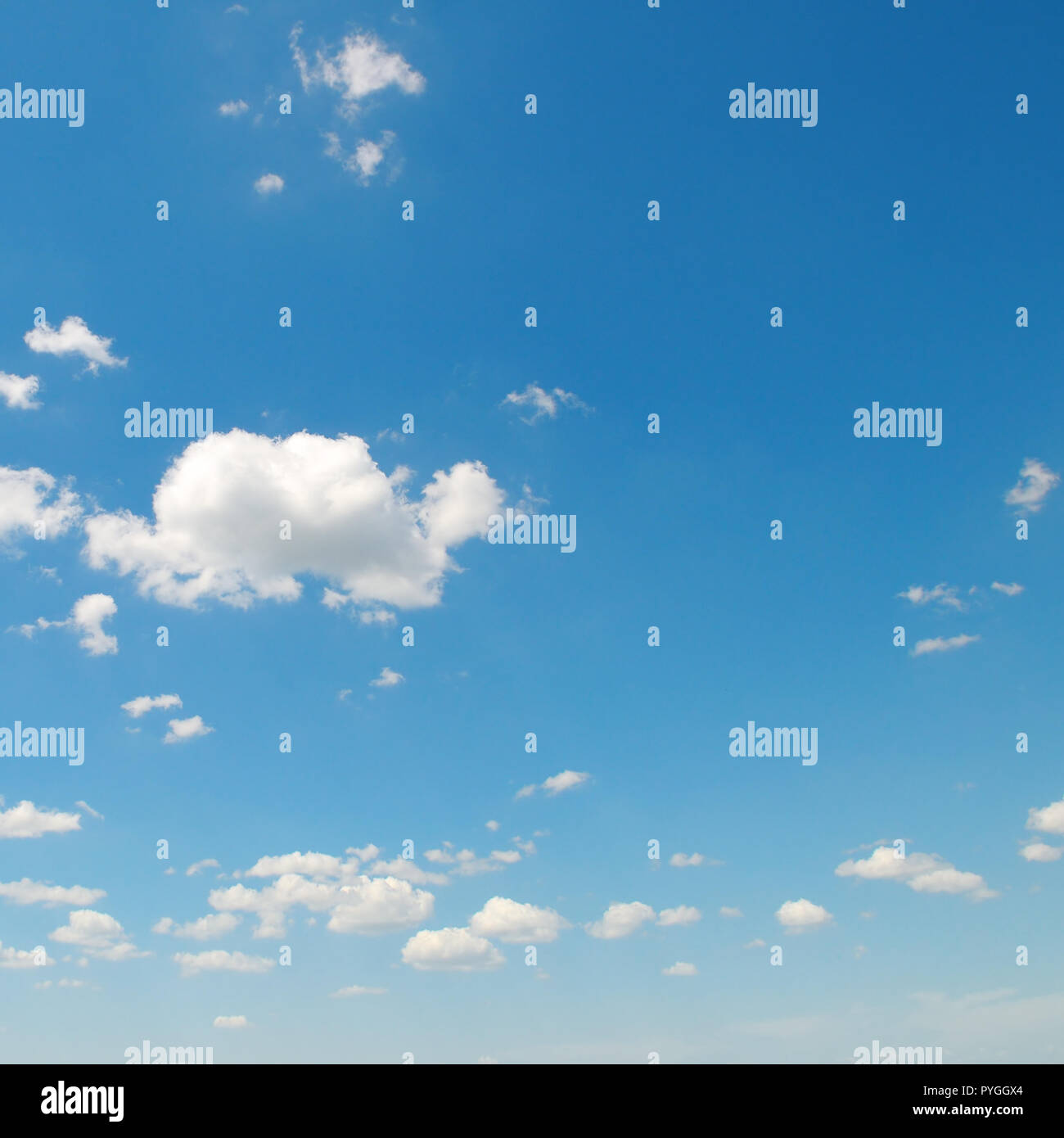 light cumulus clouds in the blue sky Stock Photo - Alamy