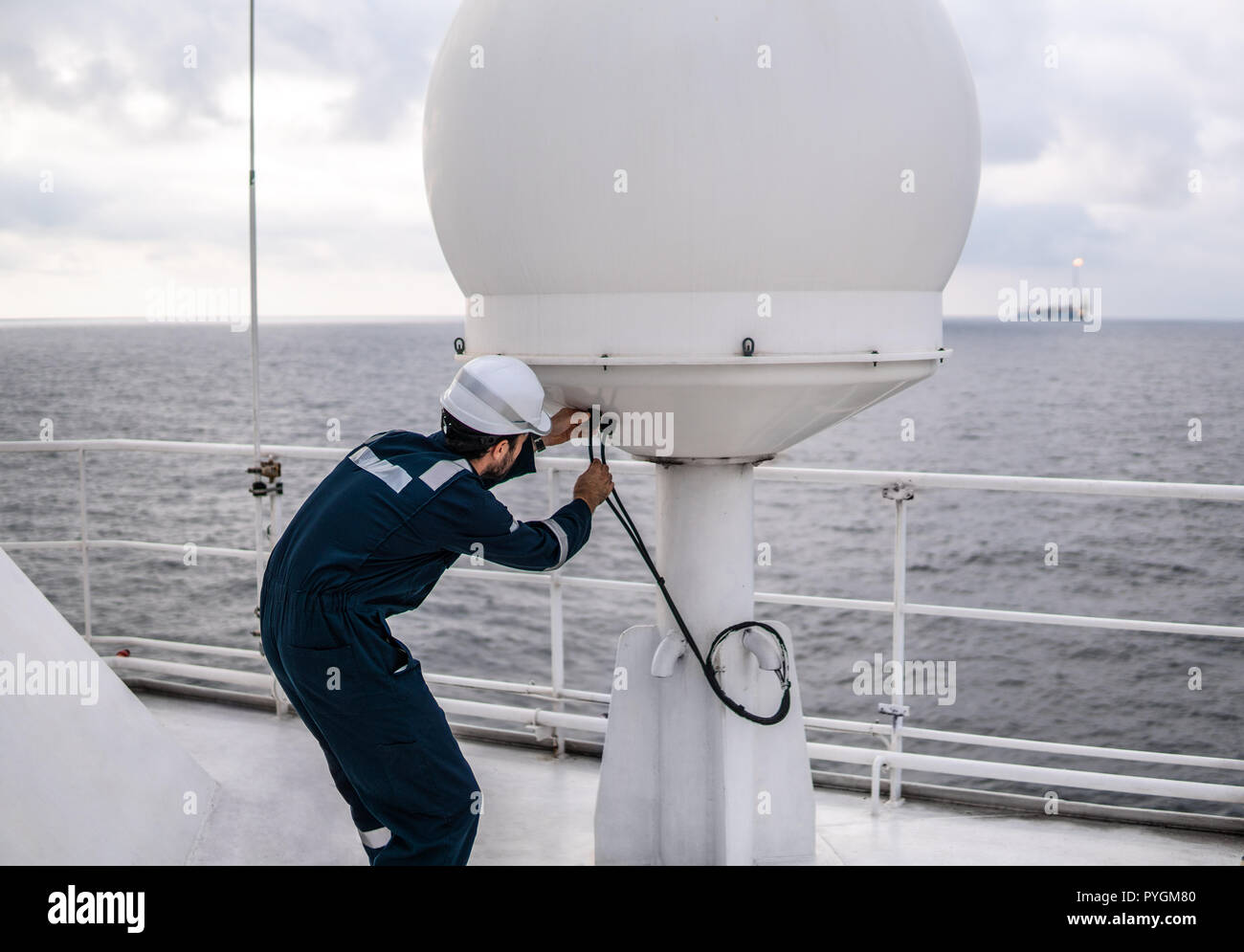 Service technician or serviceman near VSAT terminal Stock Photo - Alamy