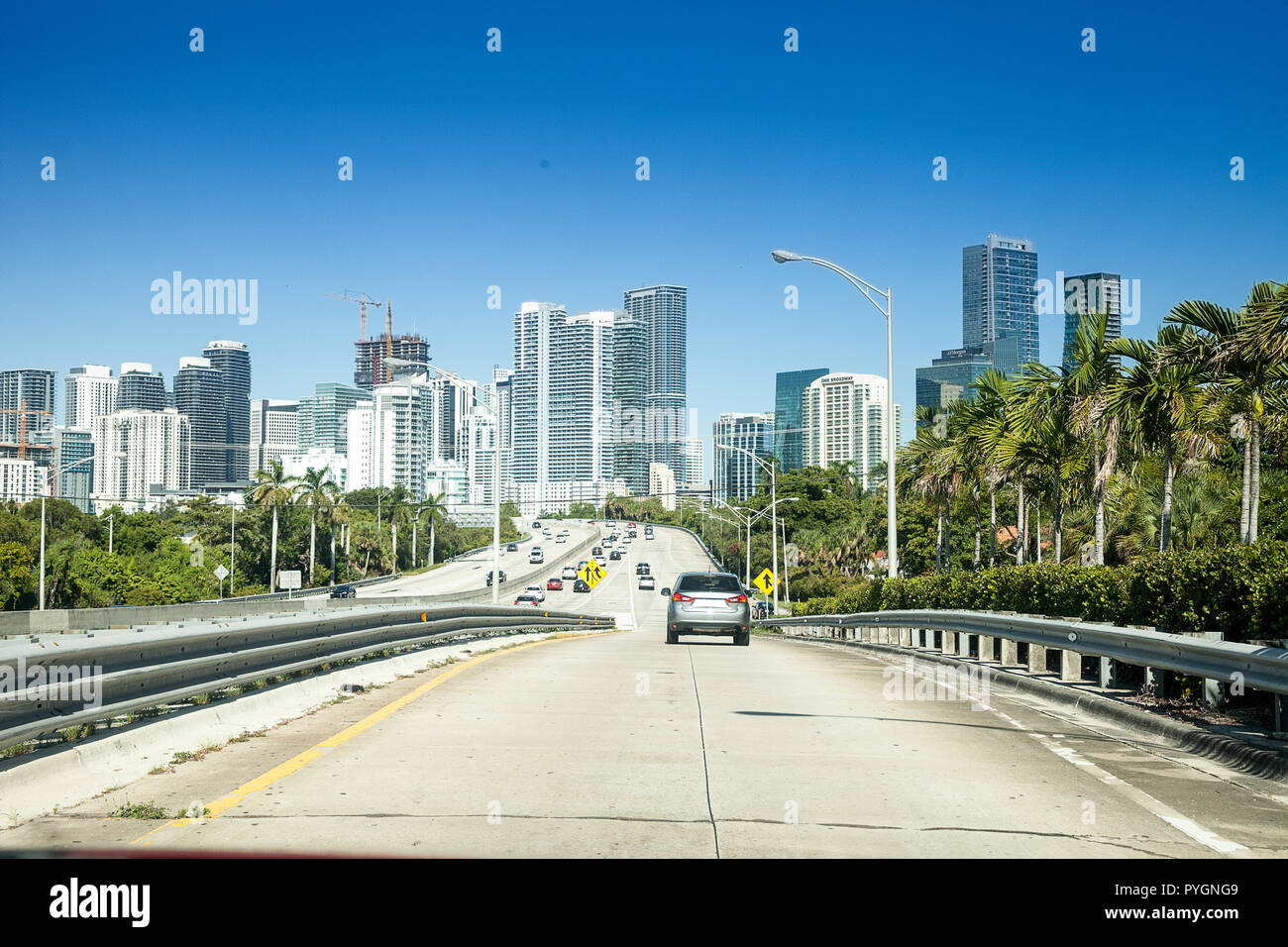Highway along Skyline of Miami, Florida in the thick of the city with ...