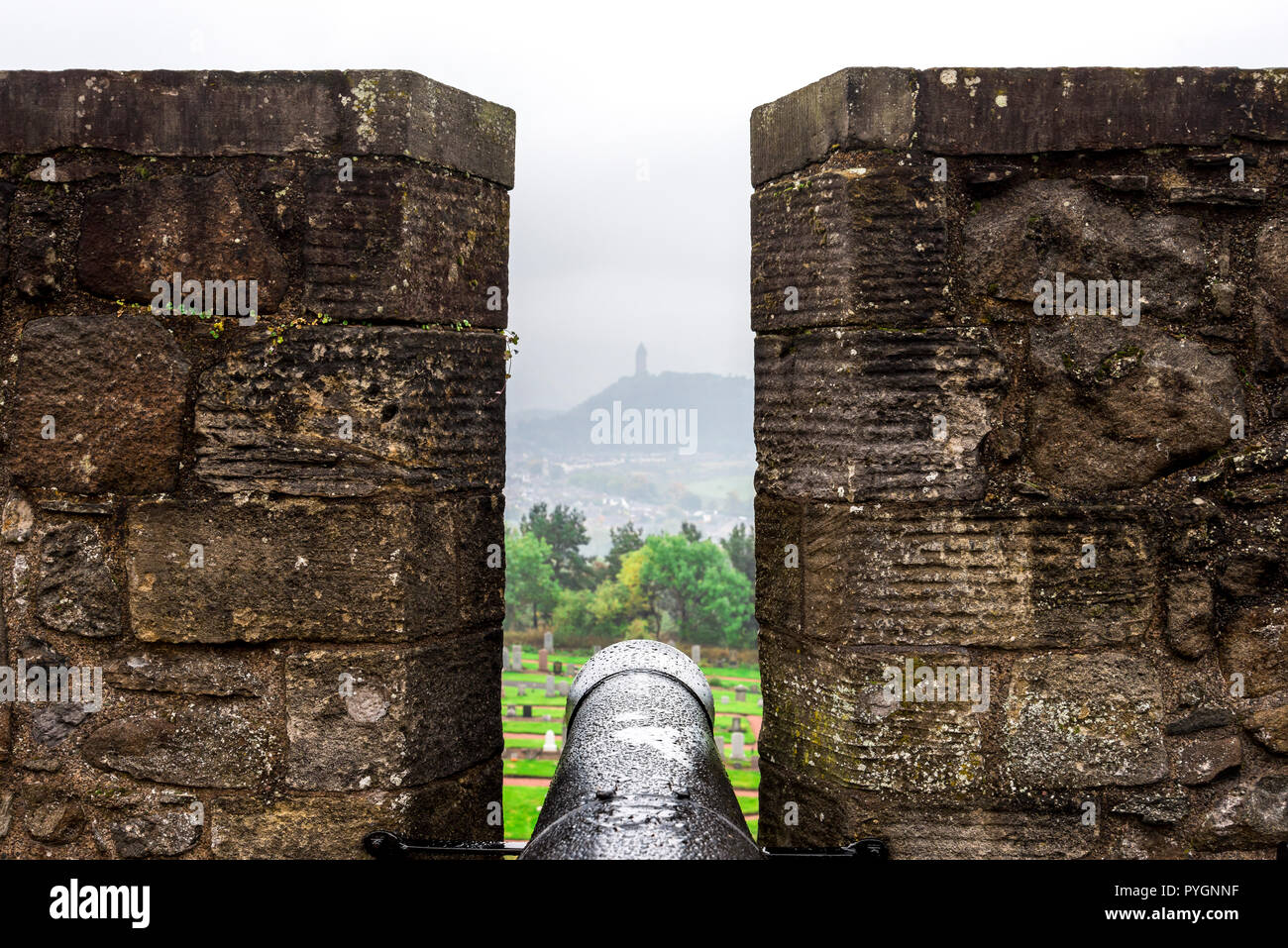 A view to National Wallace monument in distant haze from the Grand battery in Stirling Castle, Scotland Stock Photo
