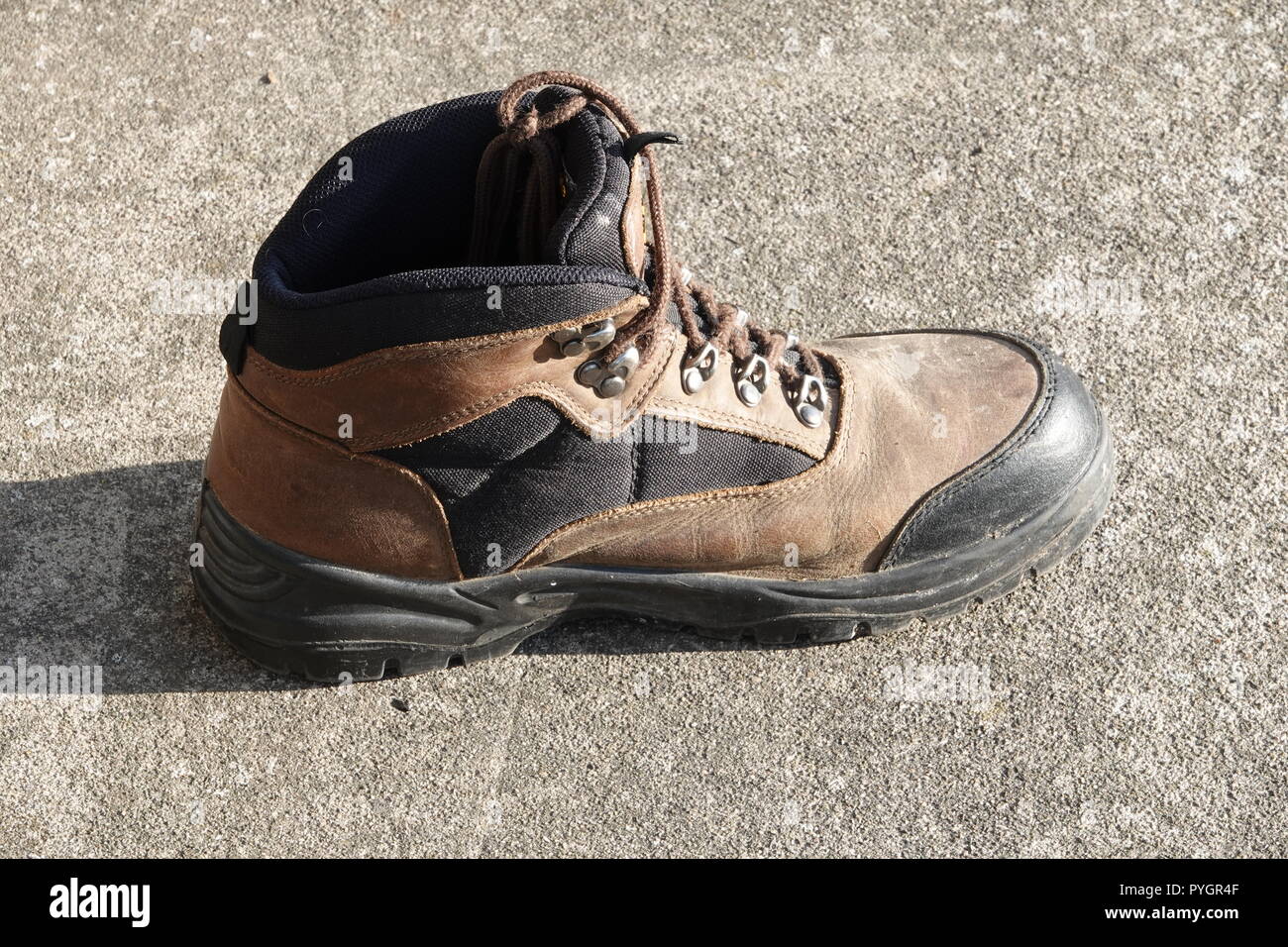 Old work boot Stock Photo - Alamy