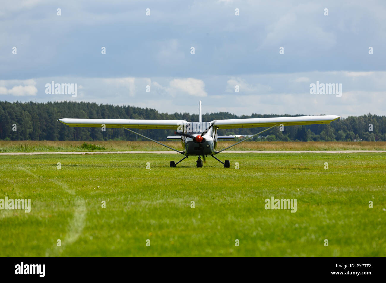 small plane on green field before take-off outdoors Stock Photo - Alamy