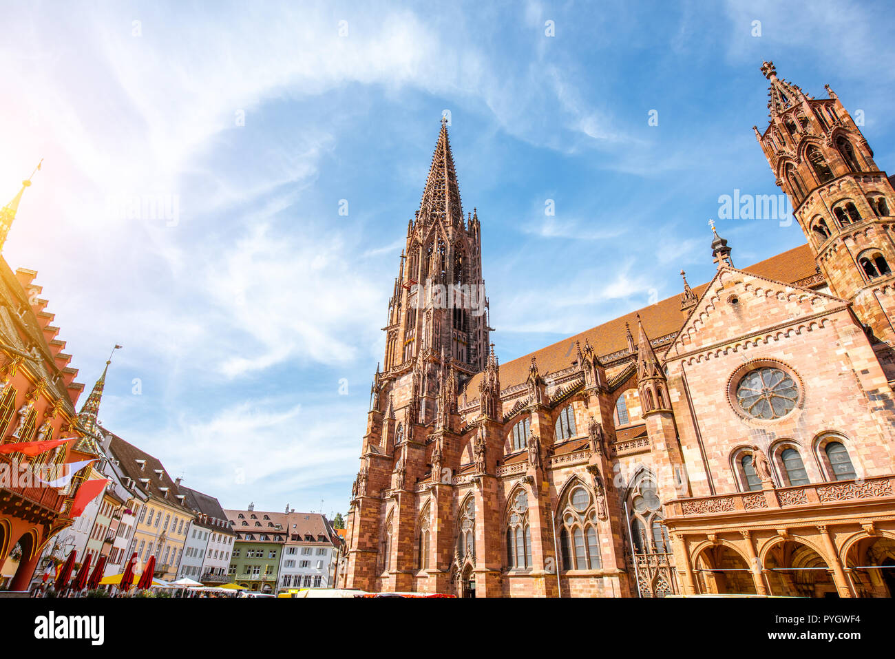 View from below on the main cathedral in the old town of Freiburg, Germany Stock Photo