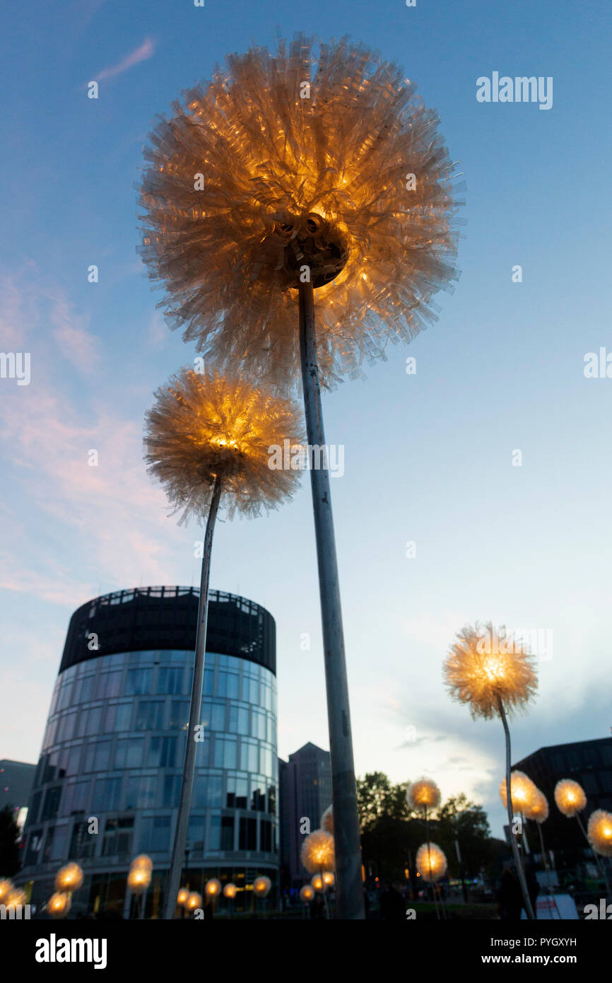 Essen, Germany. 27 October 2018. Giant Dandelions made from plastic waste by French-Filipino artist Olivia d’Aboville. The 2018 Essen Light Festival gets under way with many light art installations throughout the town centre until 4 November 2018. Stock Photo