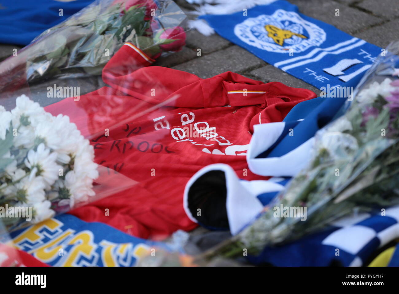 Tributes at Leicester City Foootbal Club following a helicopter used by club owner Vichai Srivaddhanaprabha, crashing into flames in a car park near the stadium shortly after 8.30pm on Saturday evening. Stock Photo