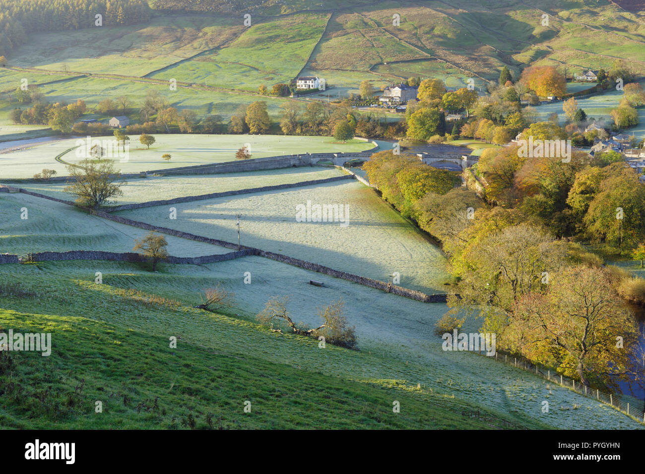 View of River Wharfe in valley bottom on frosty morning, Burnsall, Wharfedale, Yorkshire Dales, England, October Stock Photo