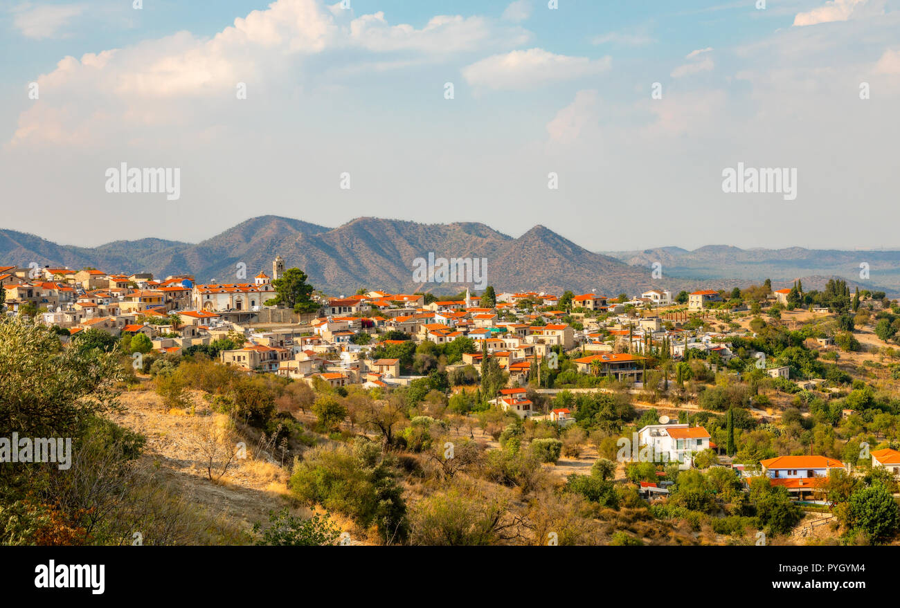 Panorama of Lefkara, traditional Cypriot village with red rooftop houses and mountains in the background, Larnaca district, Cyprus Stock Photo