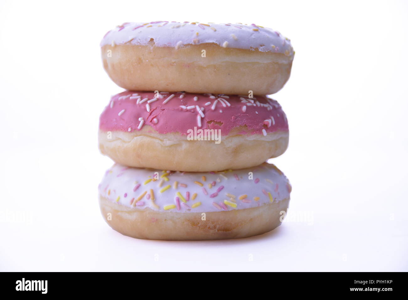 Delicious colorful donuts isolated on white background Stock Photo - Alamy
