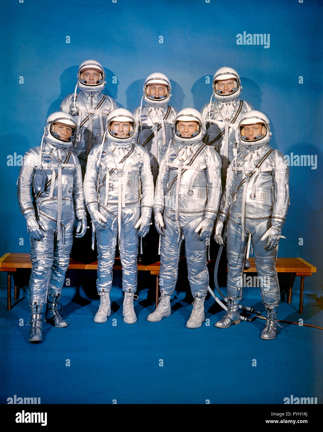 These seven men, wearing spacesuits in this portrait, composed the first group of astronauts announced by the National Aeronautics and Space Administration (NASA). They were selected in April of 1959 for the Mercury Program. Front row, left to right, are Walter M. Schirra Jr., Donald K. Slayton, John H. Glenn Jr., and M. Scott Carpenter. Back row, left to right, are Alan B. Shepard Jr., Virgil I. Grissom and L. Gordon Cooper Jr. Stock Photo
