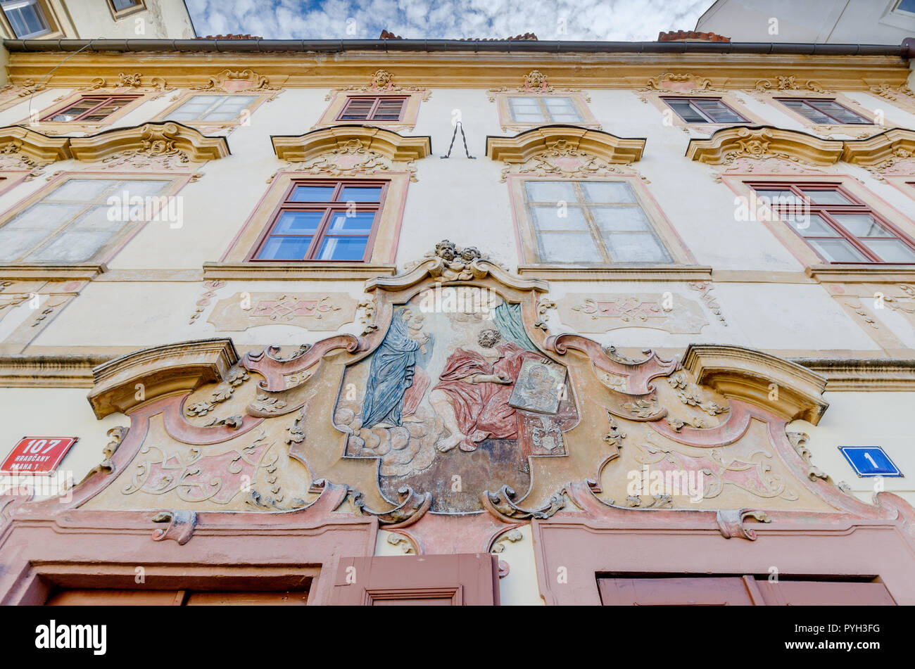 Decorative coat of arms - medieval designation of the house of the 'U  Cerneho Vola' beerhall buillding. Prague, Hradcany district, Czech Republic  Stock Photo - Alamy