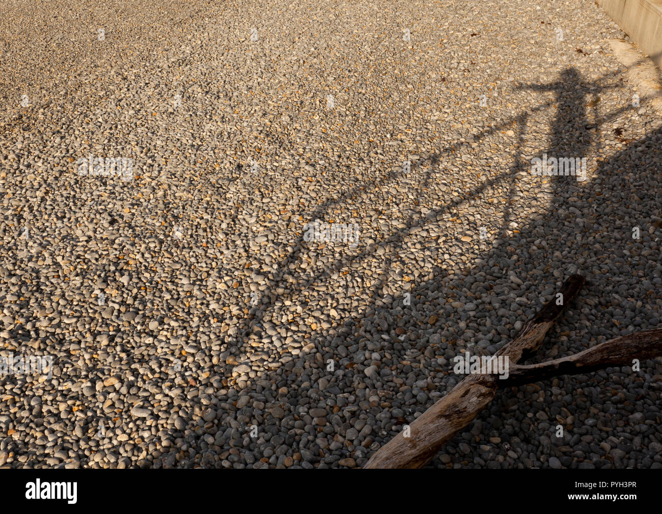 Shadow of a woman with outstretched arms Stock Photo