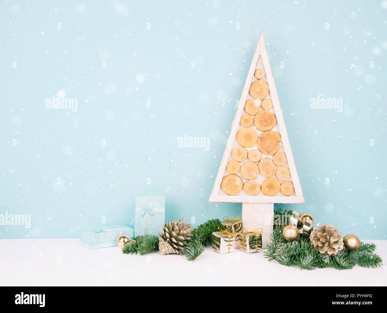 Christmas wooden tree over dark light blue background Stock Photo - Alamy